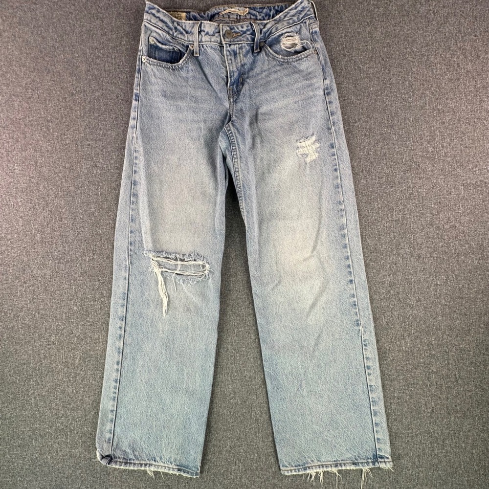 Levi's Jeans Womens 26 Low Loose Ample Bas Light Wash Distressed Denim